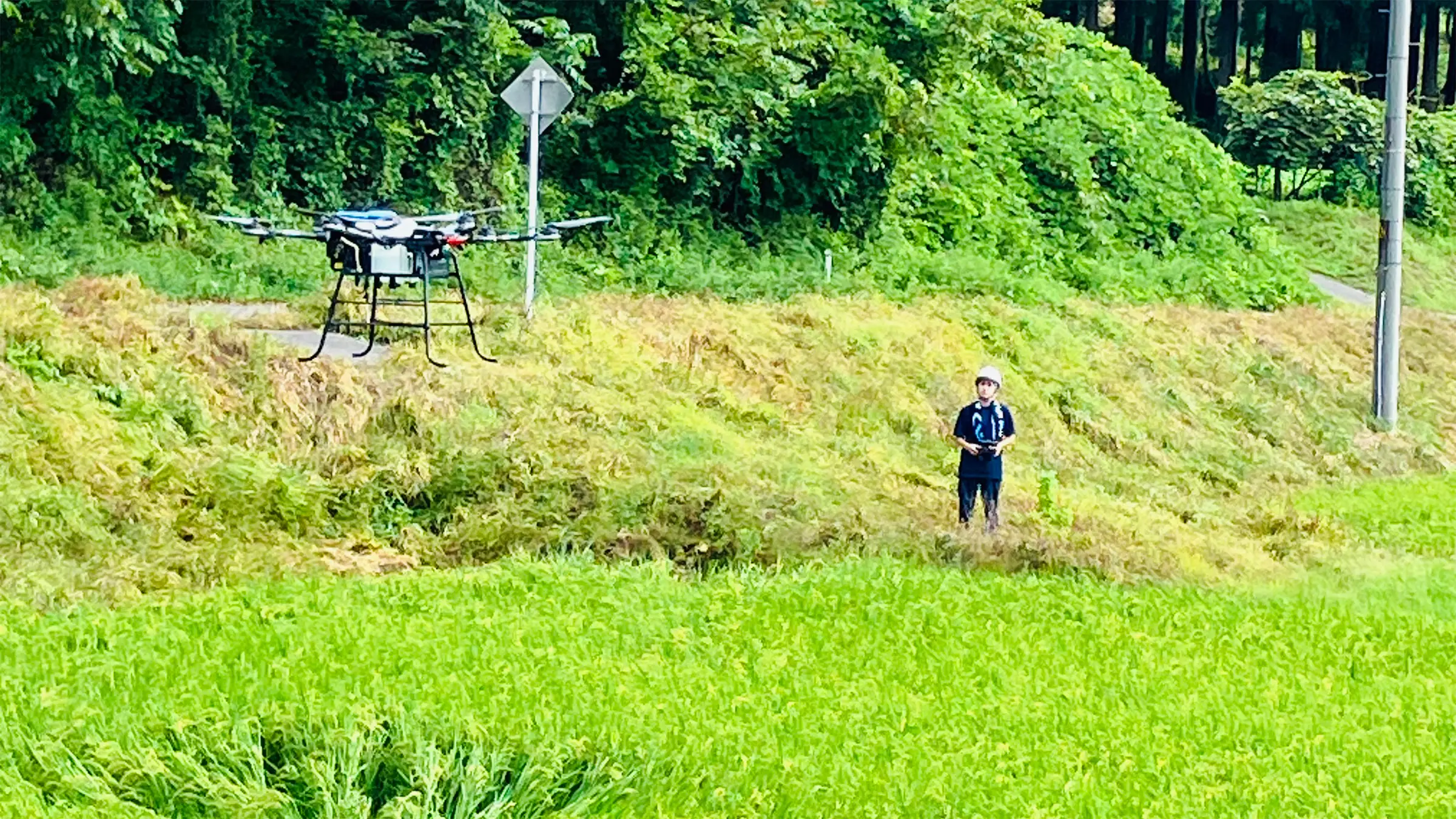 High school student piloting a drone.