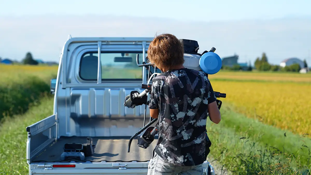 Mr. Chiba carrying a drone.